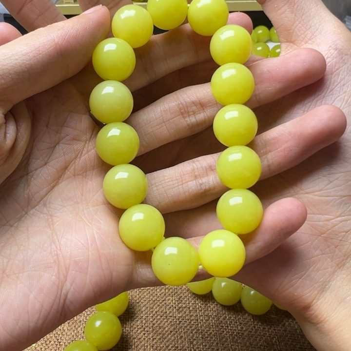 演***伟新疆黄口卡14正黄手串