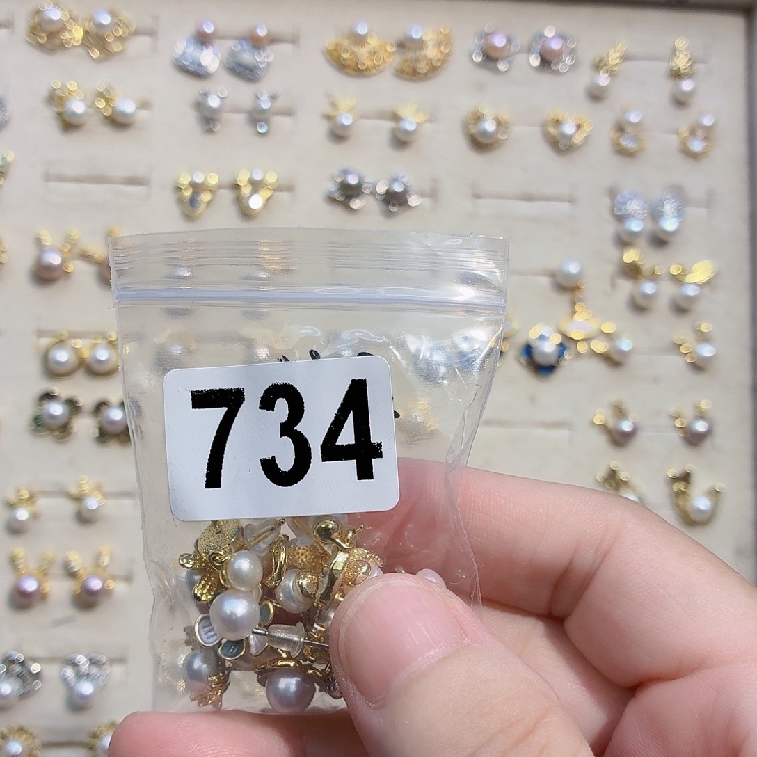 抚***尘淡水珍珠合金耳饰