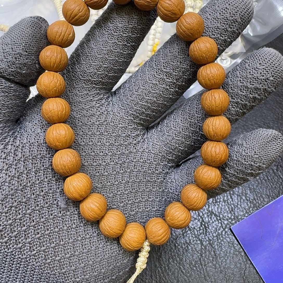 一***饭猴头核桃吊坠12➕凤羽手持