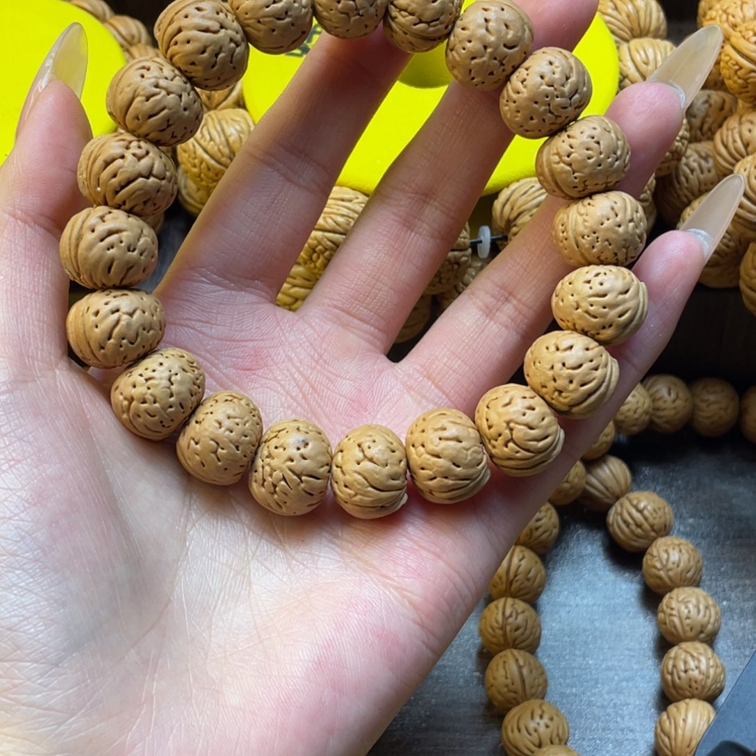 桃核手串?树王纽扣