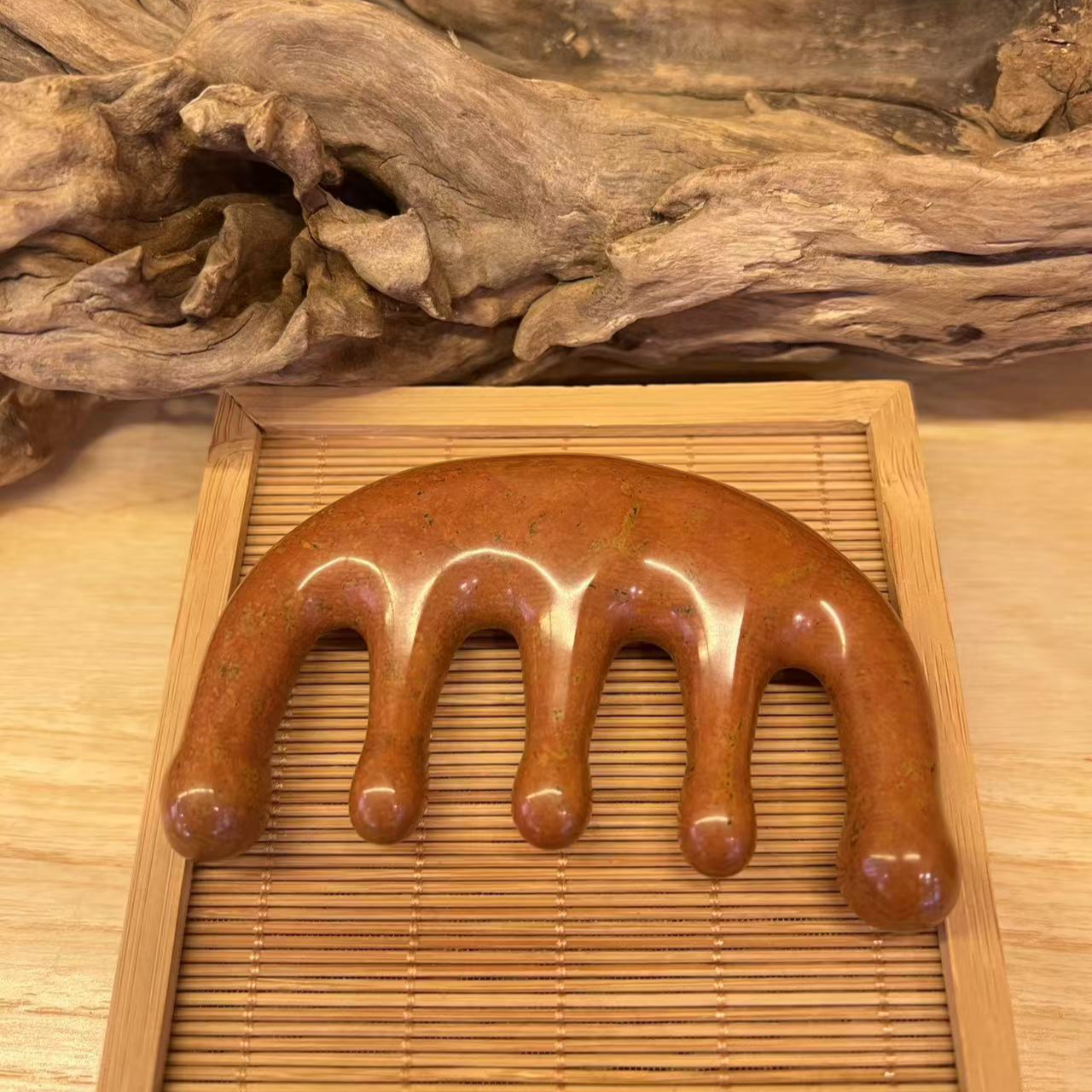 泗水砭石文化博物馆推荐红砭石圆头五齿梳