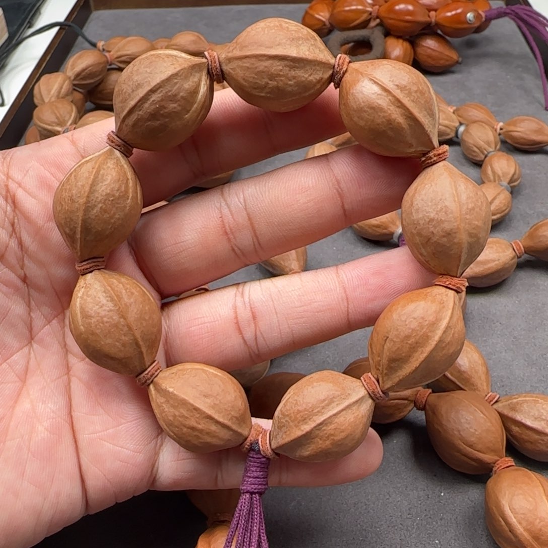 紫***来手串橄榄核1.9x2.7 梅林铁核