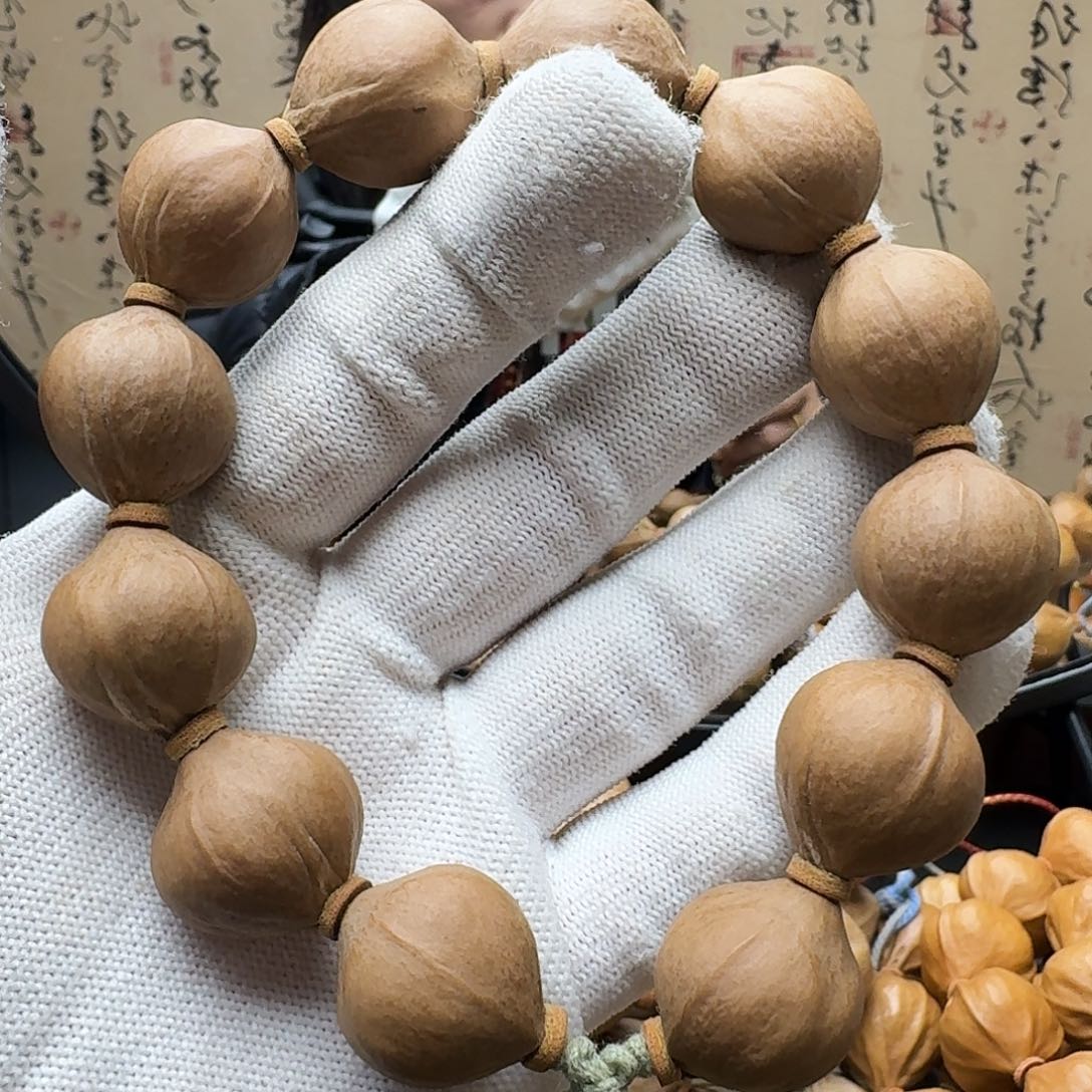 柿****手串橄榄核铁核圆