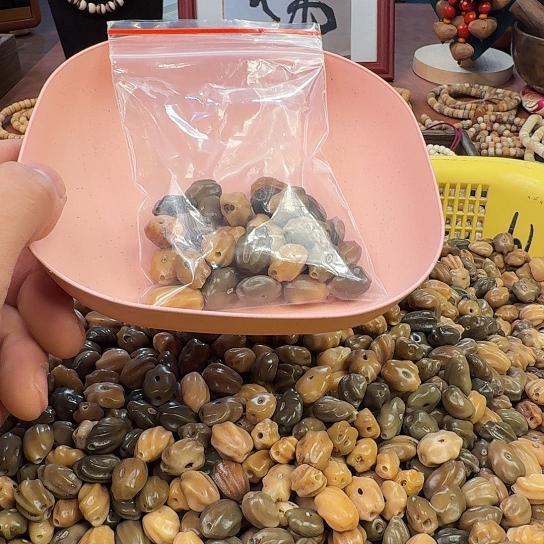 手串菩提根/象牙果龙脊菩提原料散籽已打孔