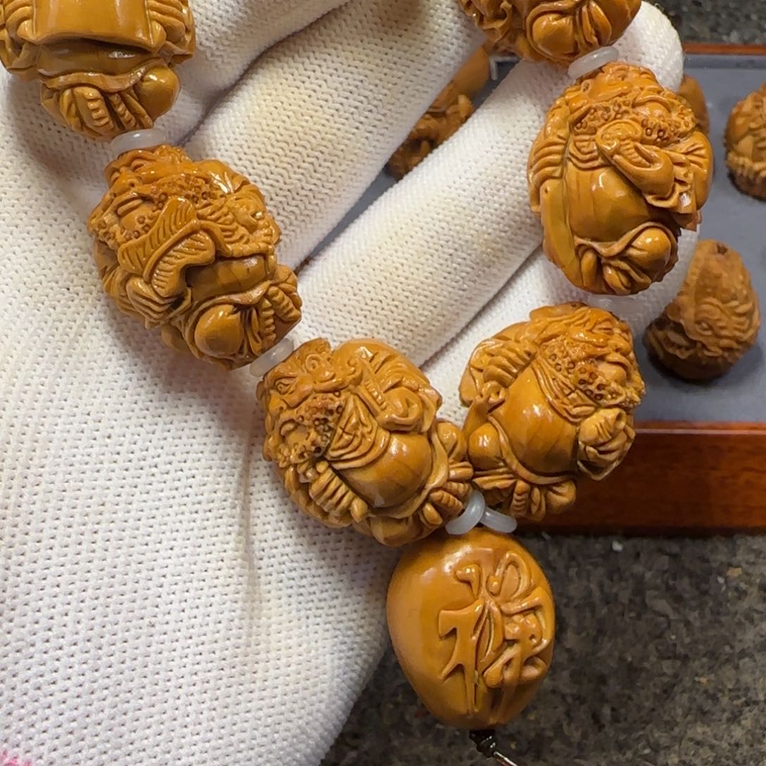 橄榄核吊坠秒女达摩