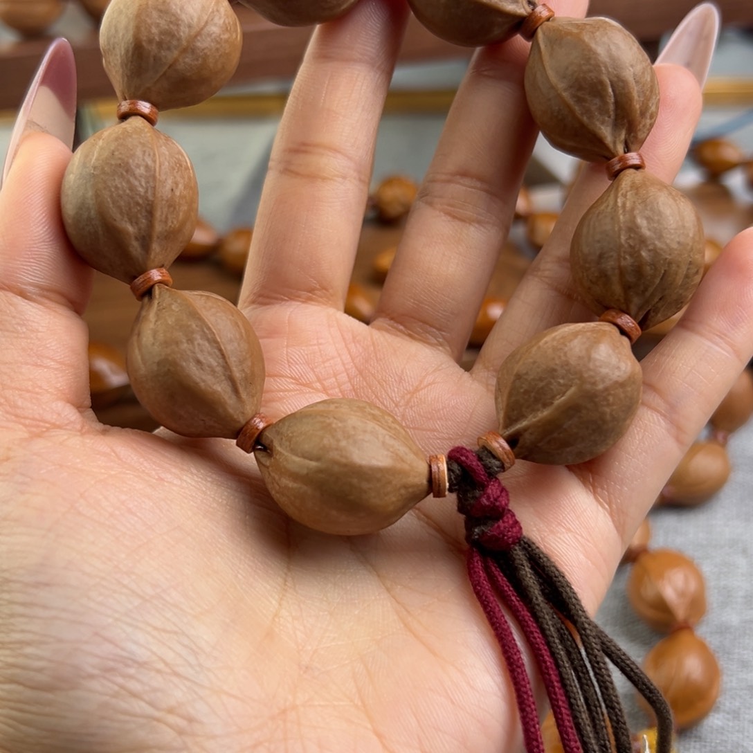 夏***洲手串橄榄核20/26 三花梅林铁核