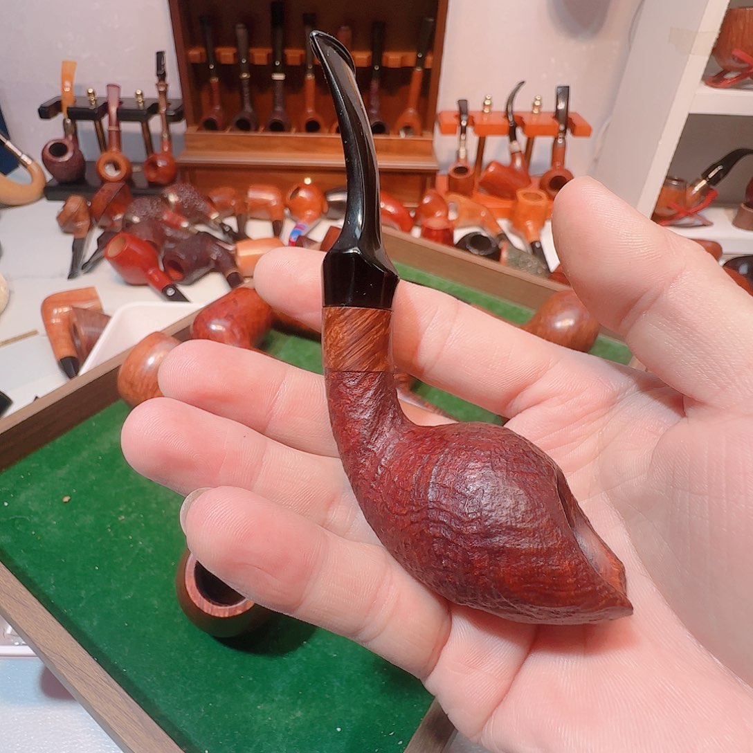 行***涯拉塞，石楠木工艺品烟斗