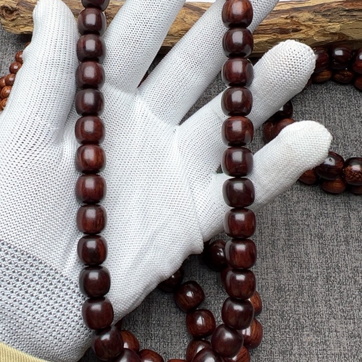 木海南红降1.2手持黑金满芝麻点