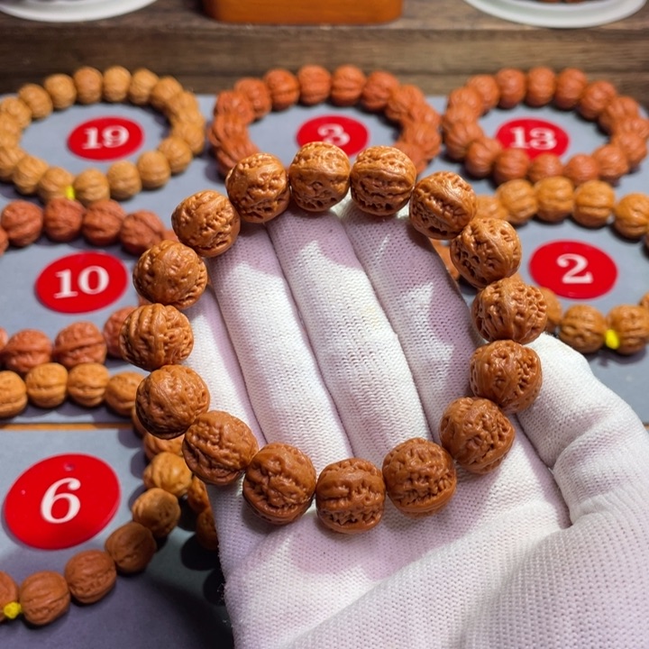 文玩核桃手串元宝磨盘