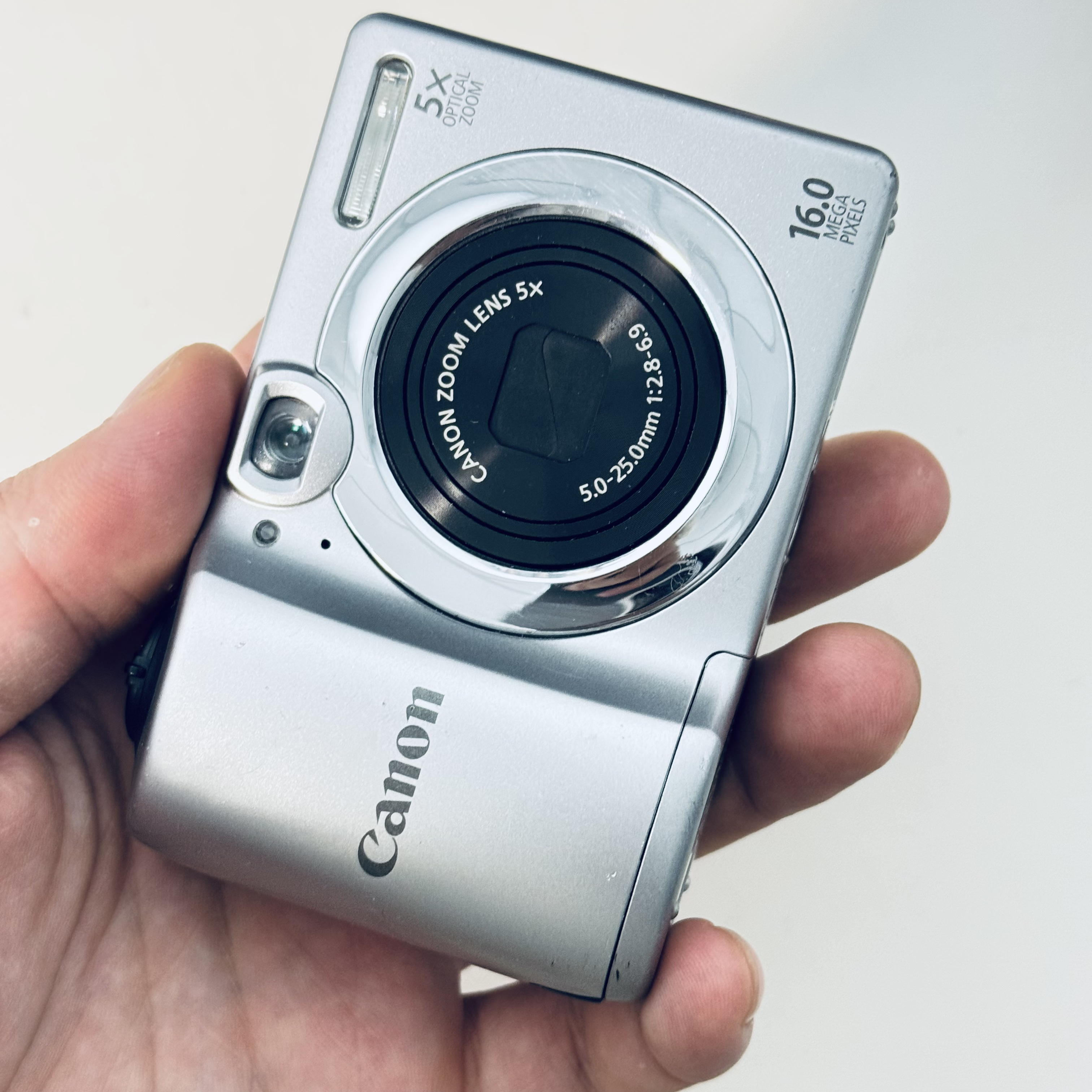 9新 Canon/佳能 a1300特价1600w像素5倍光变冷白五号电池自备