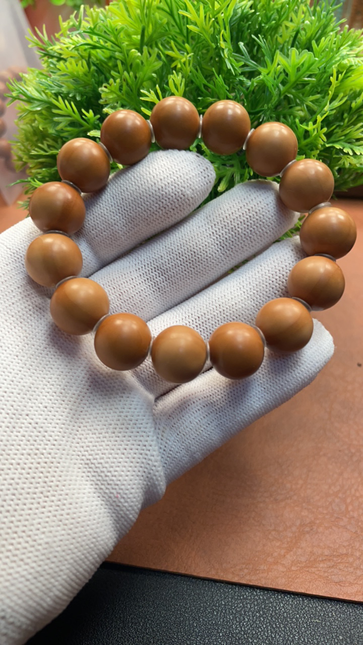 橄榄核1.5微花正圆光珠