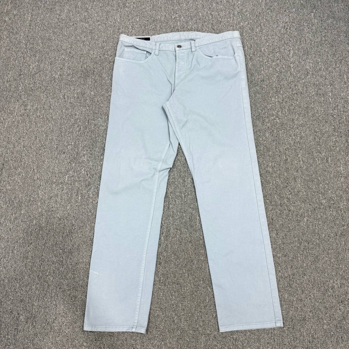 99新 GUCCI/古驰 14676344 Gucci古驰 浅蓝色皮牌logo牛仔裤 50码