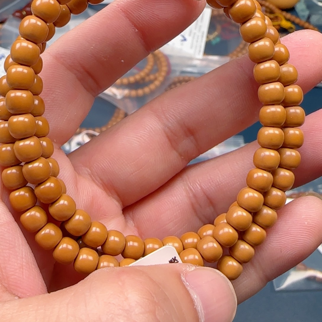 橄榄核手串老挝SS级核尖极限弧尺寸6.7全无白