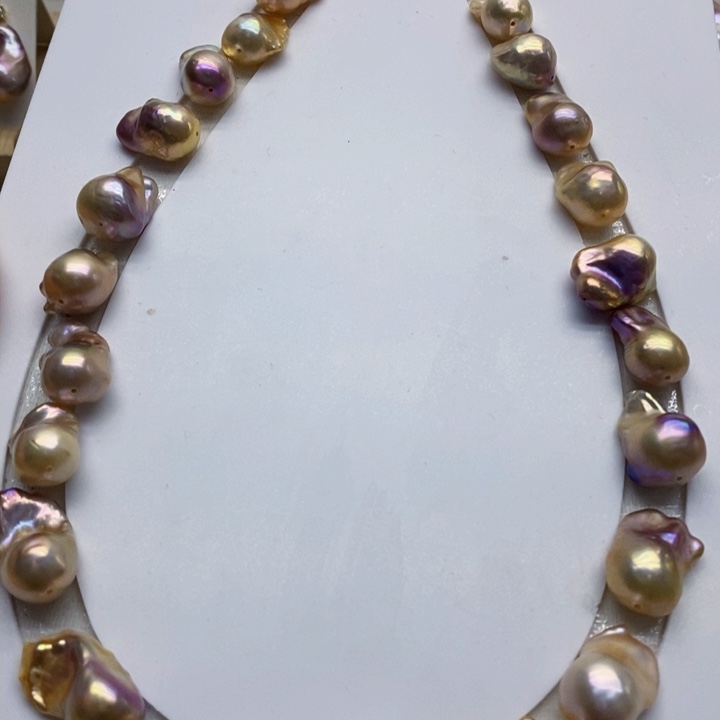 银S925镶嵌淡水珍珠耳饰杨****3