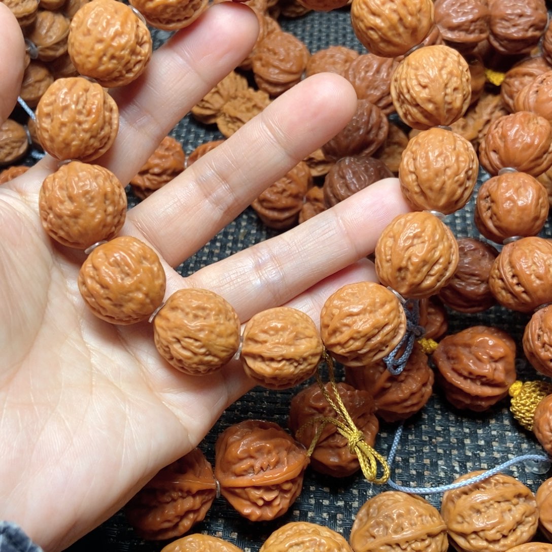 刘***饮桃核手串荔枝纹手串