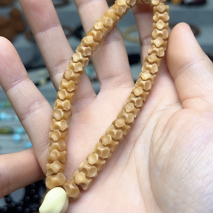 菩提根/象牙果吊坠~8.6mm龙脊龙骨手持