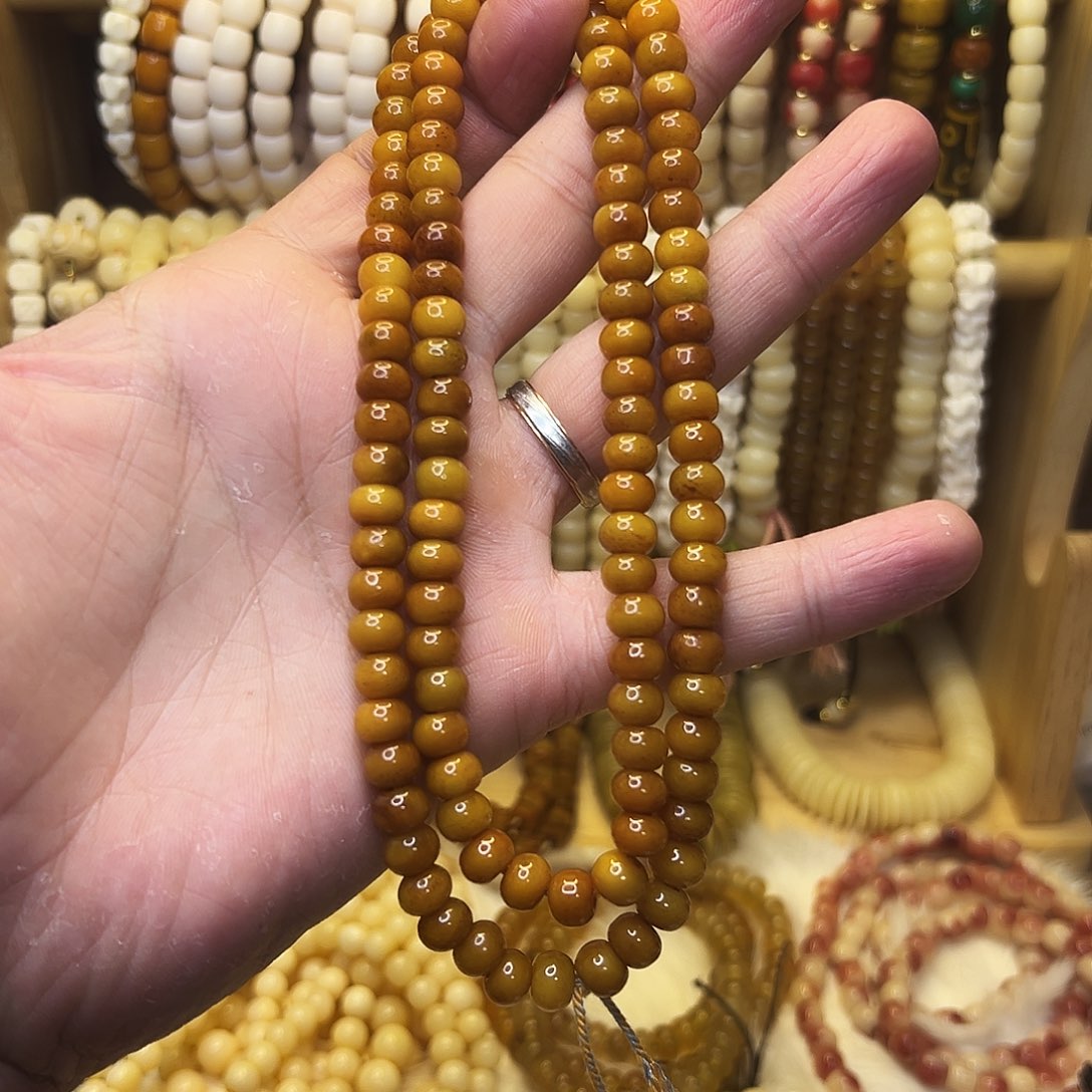 桃核把件0.8牦牛骨108