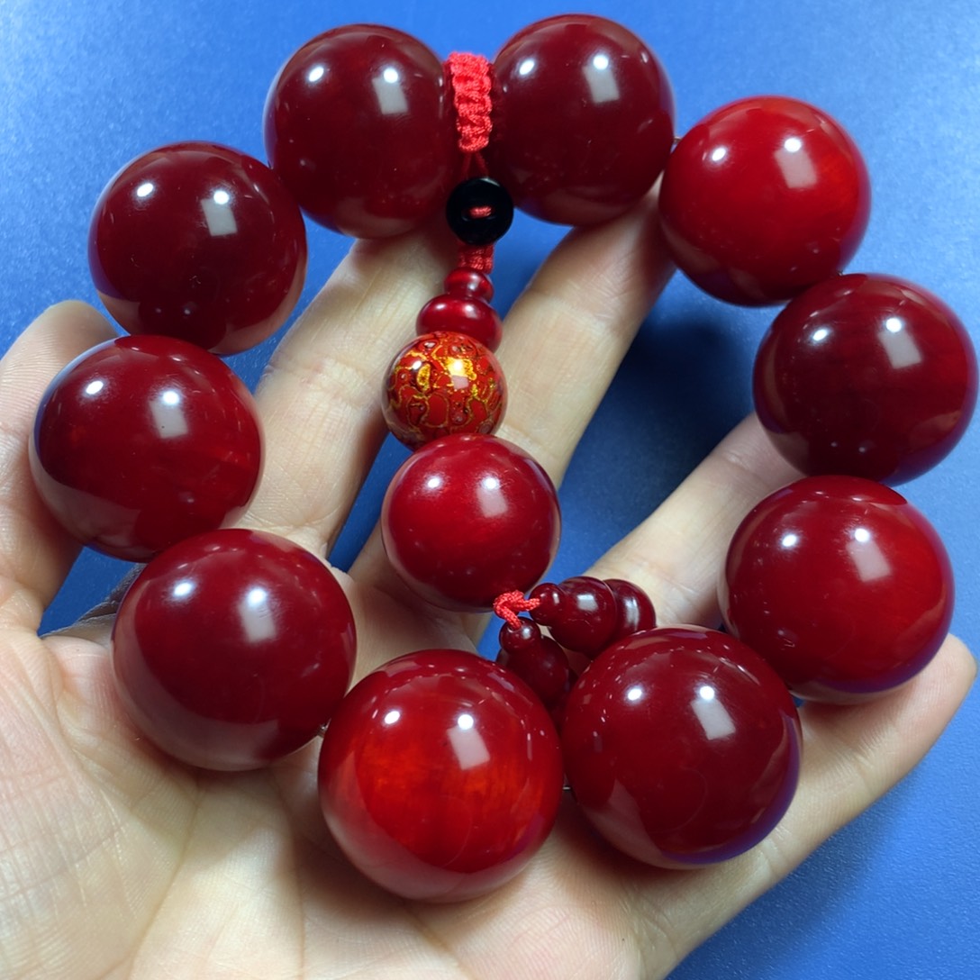 贝壳杉快****三血龙木手串2.5十颗