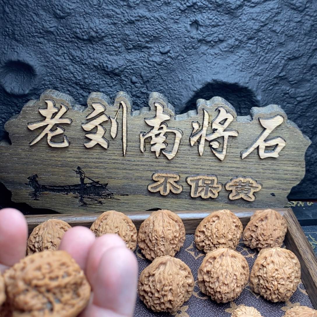 吊坠桃核在*上涿鹿南将石