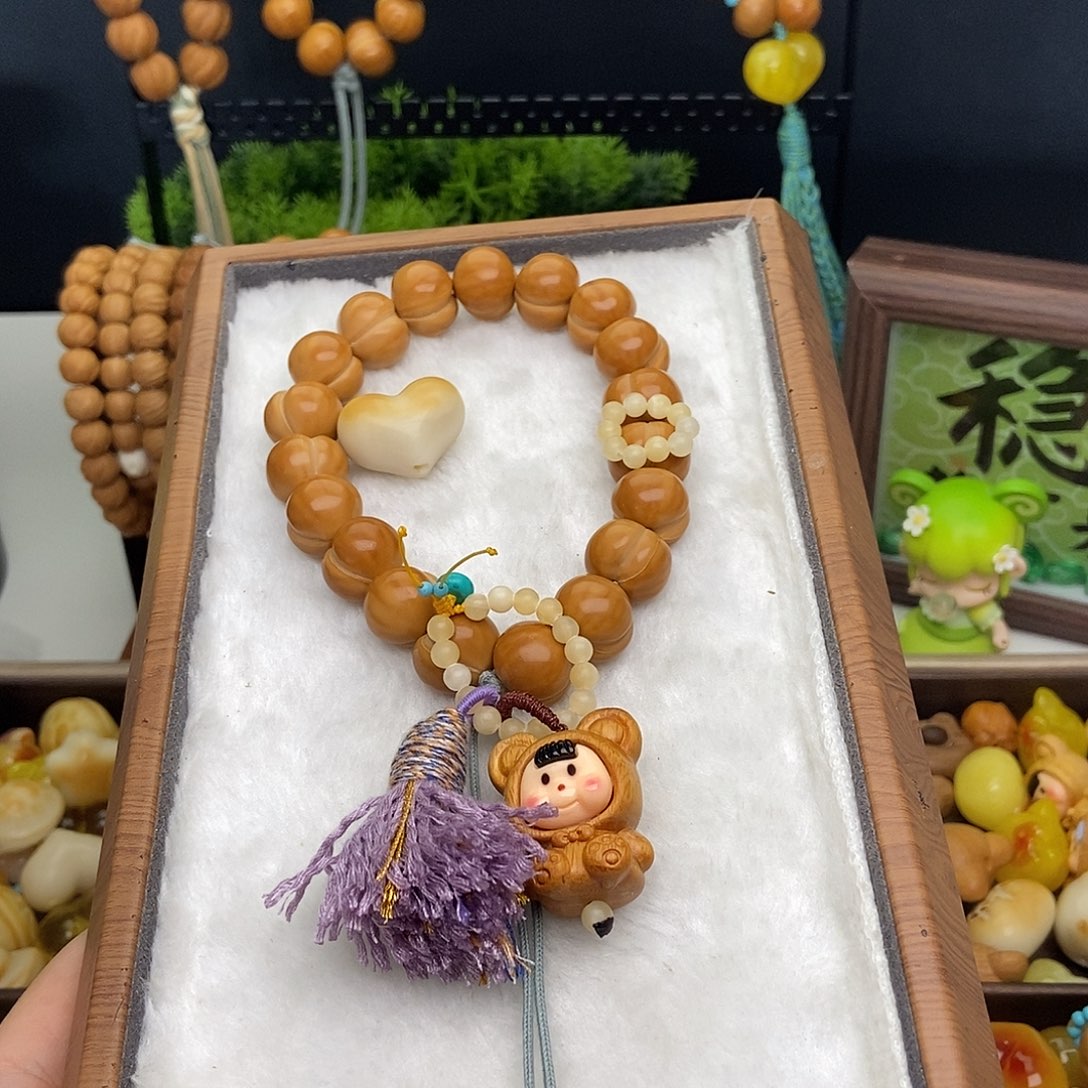 刘***儿吊坠猴头核桃猴头手串一套全品跑环卡环爱心
