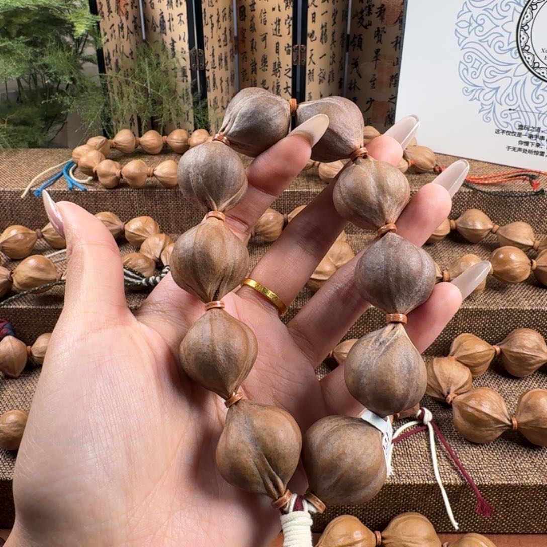 吊坠橄榄核紫皮三花2.4