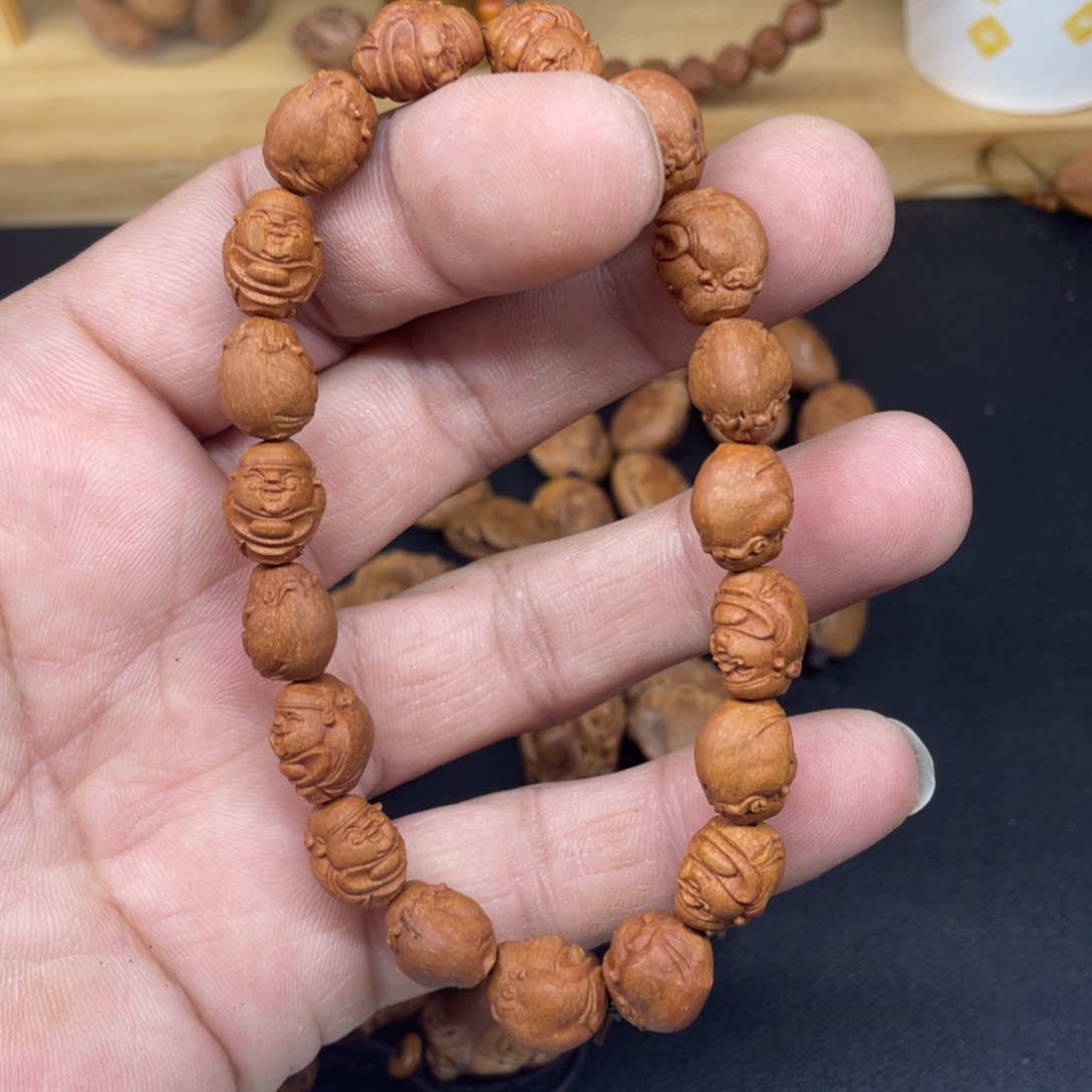 龙纹桃核财神手串