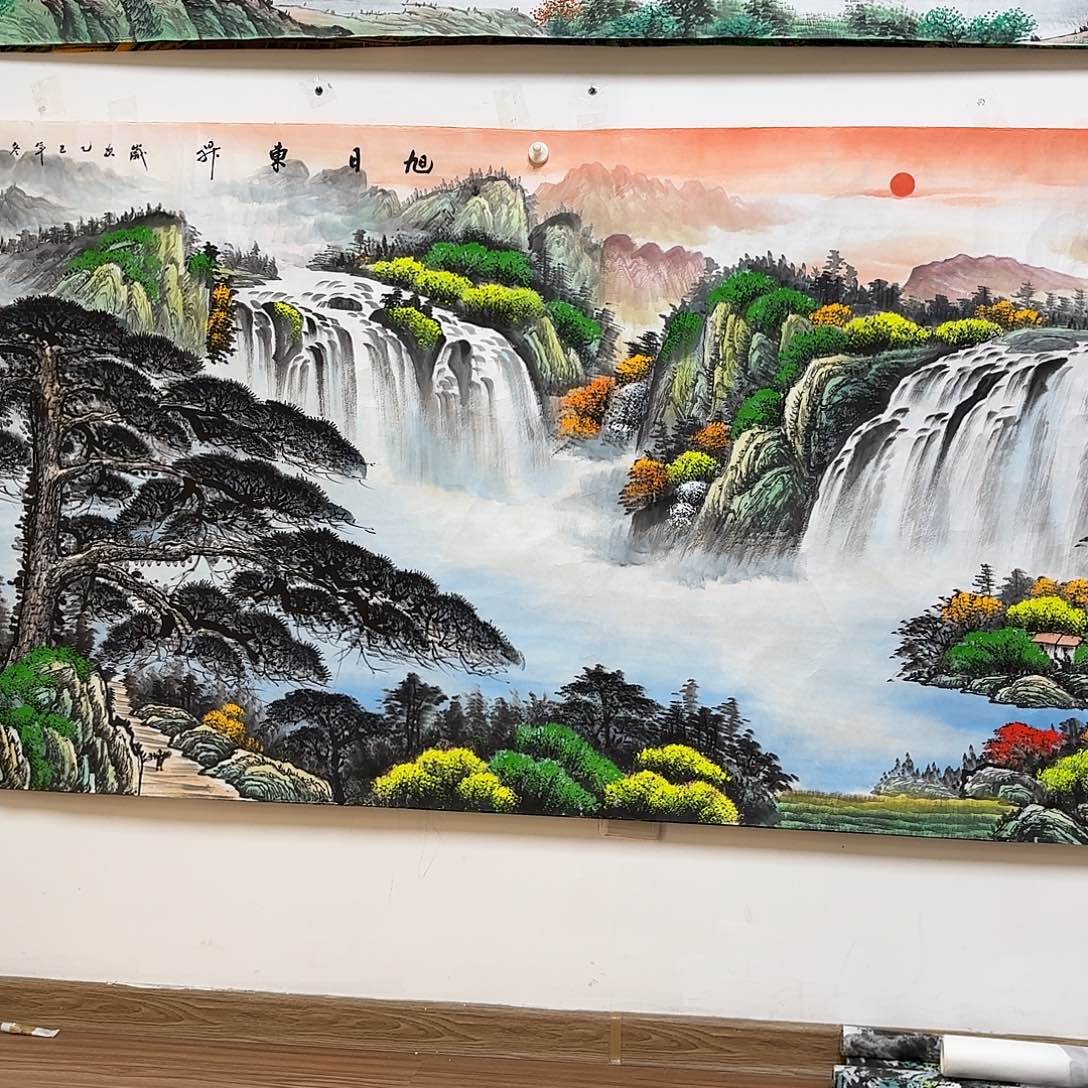 耕***夫国画2.4米长的旭日东升