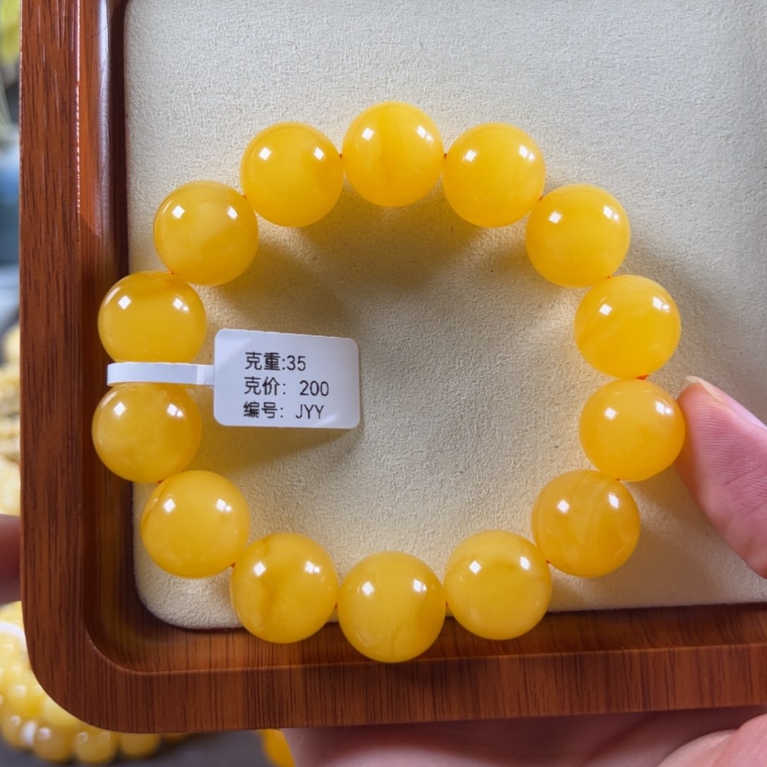 蜜蜡未镶嵌珠宝奇石16mm+焦皮同料鸡油红圆珠浓蜡飘花jyy