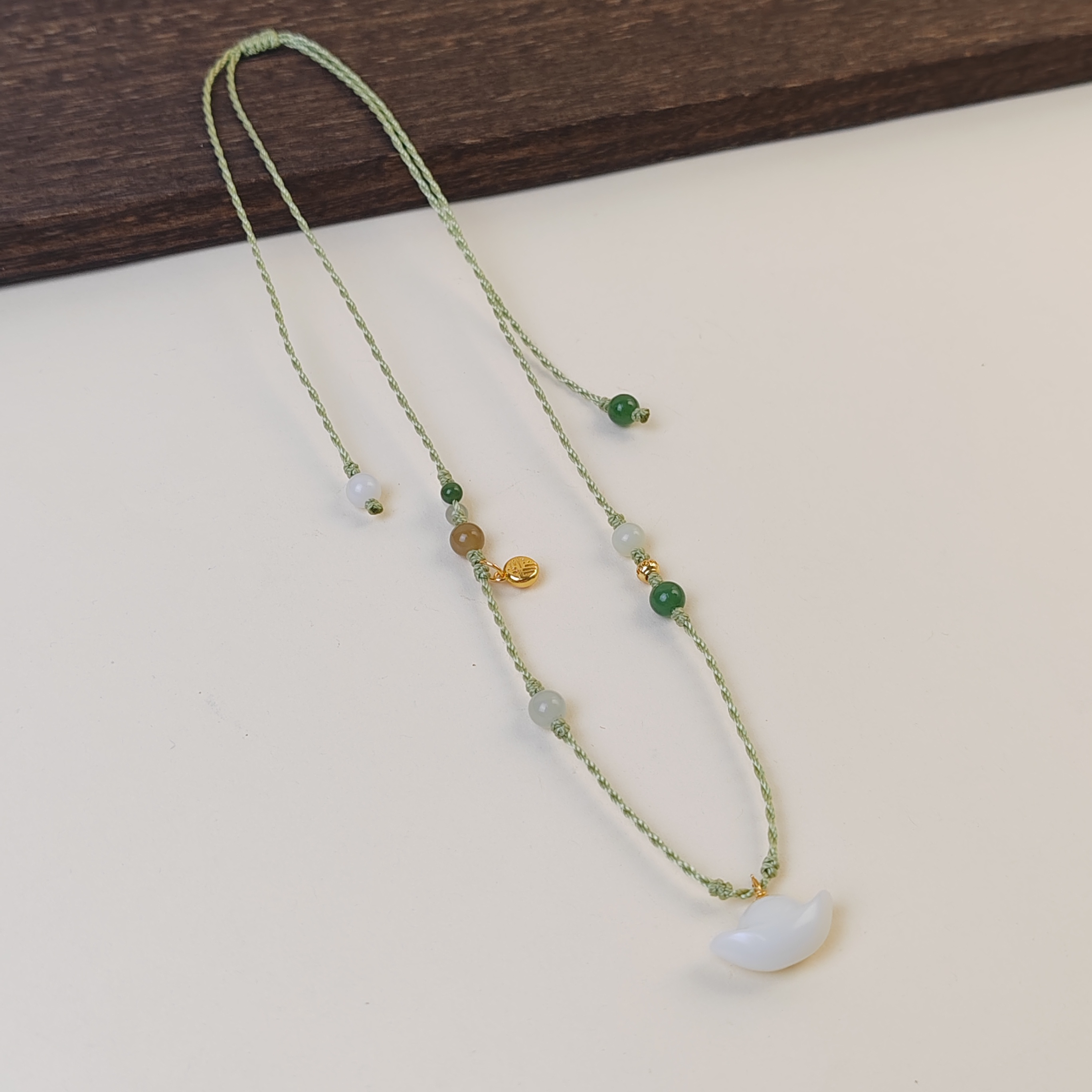 新疆白玉小元宝手工编绳项链