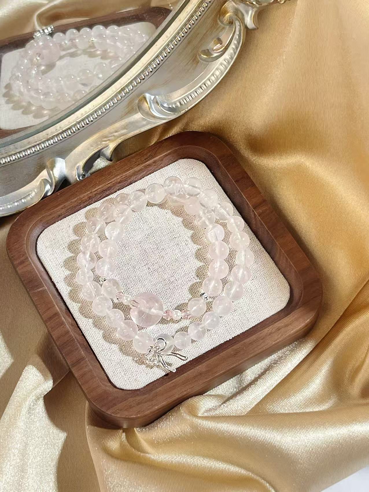 P102（美乐蒂）胖月亮双圈粉水晶手串