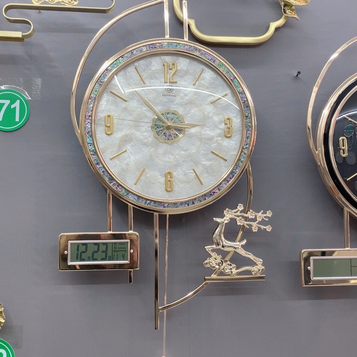 指针款贝壳日历挂钟