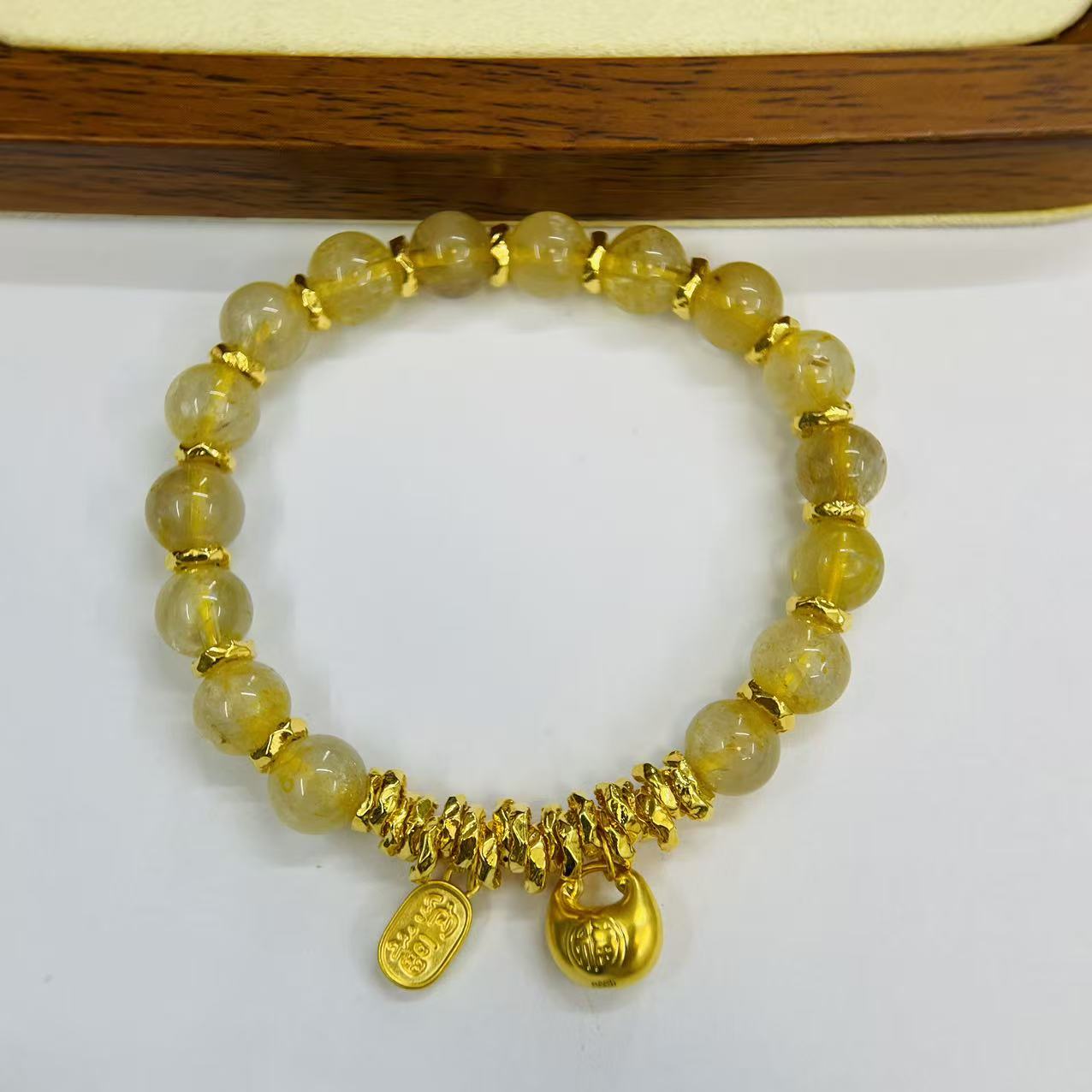 君潮黄金足金999金发晶小胖福盘缠手串DP2309