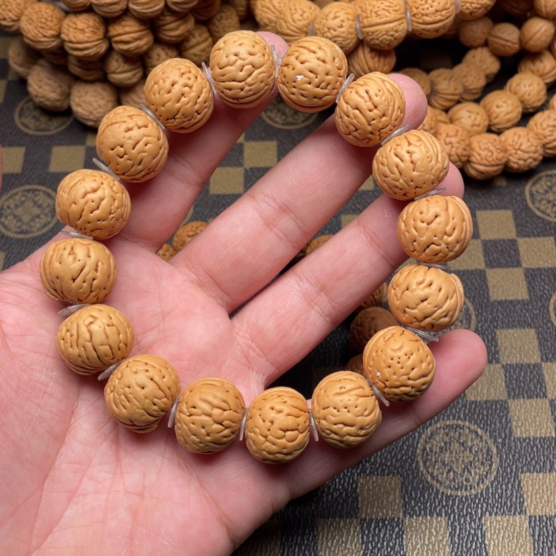 桃核吊坠肉纹元宝肉纹元宝