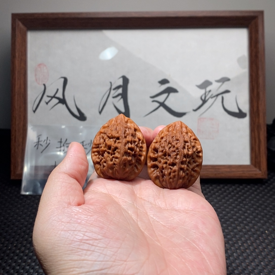 斯***羽文玩核桃吊坠鸡心