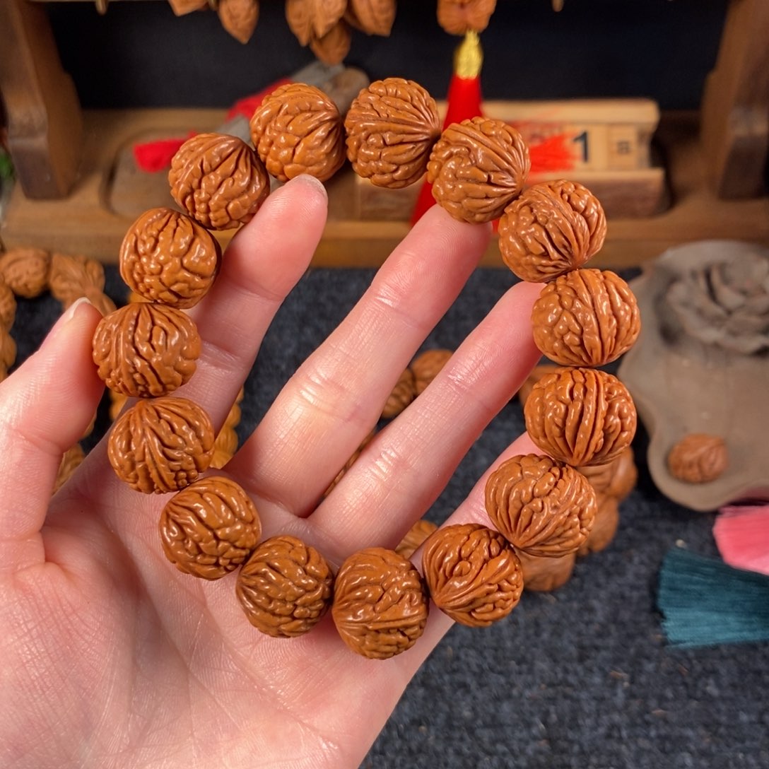 吊坠桃核桃枭手串