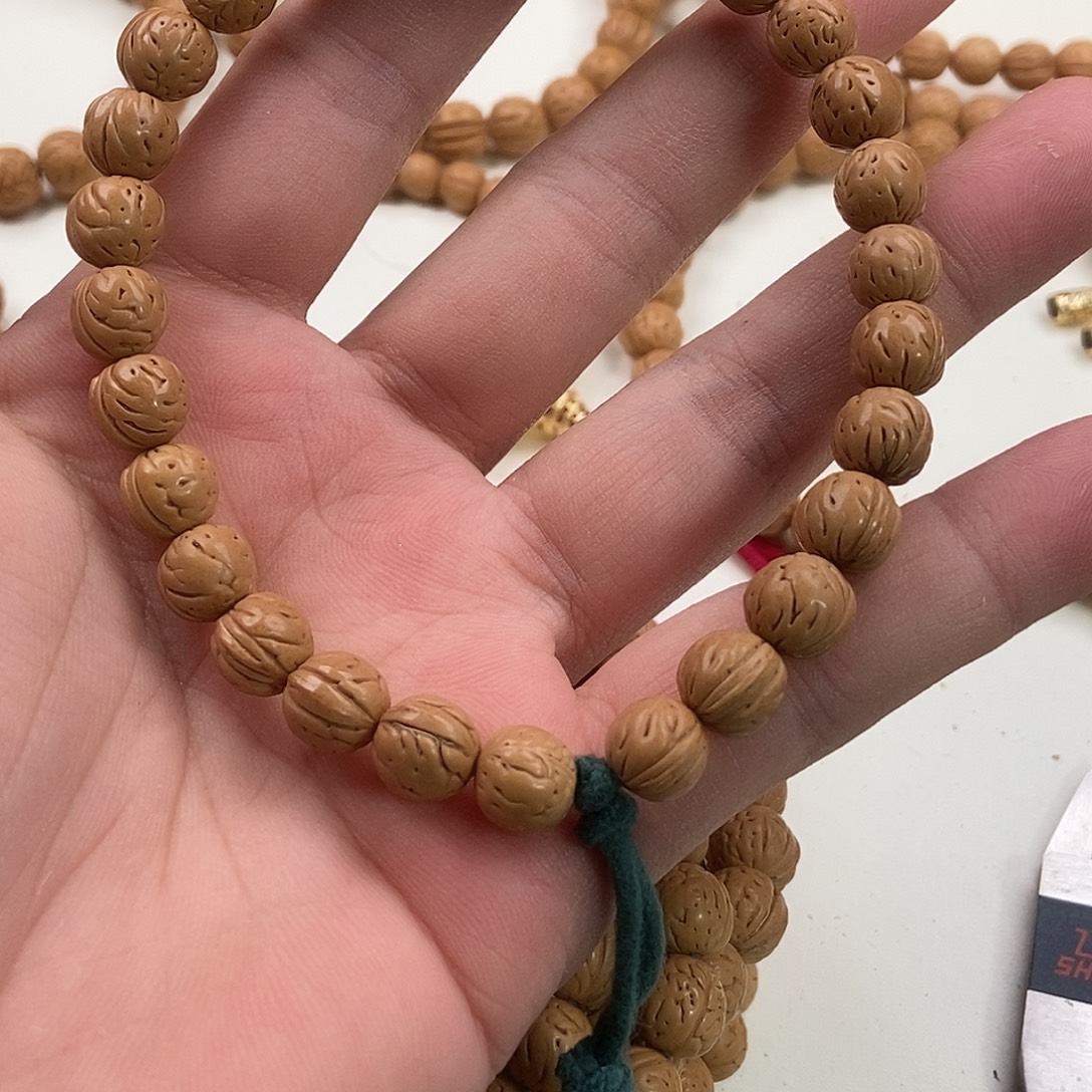 拉***索桃核吊坠1111111111111