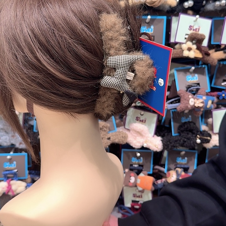 咖色格子狗抓夹毛毛