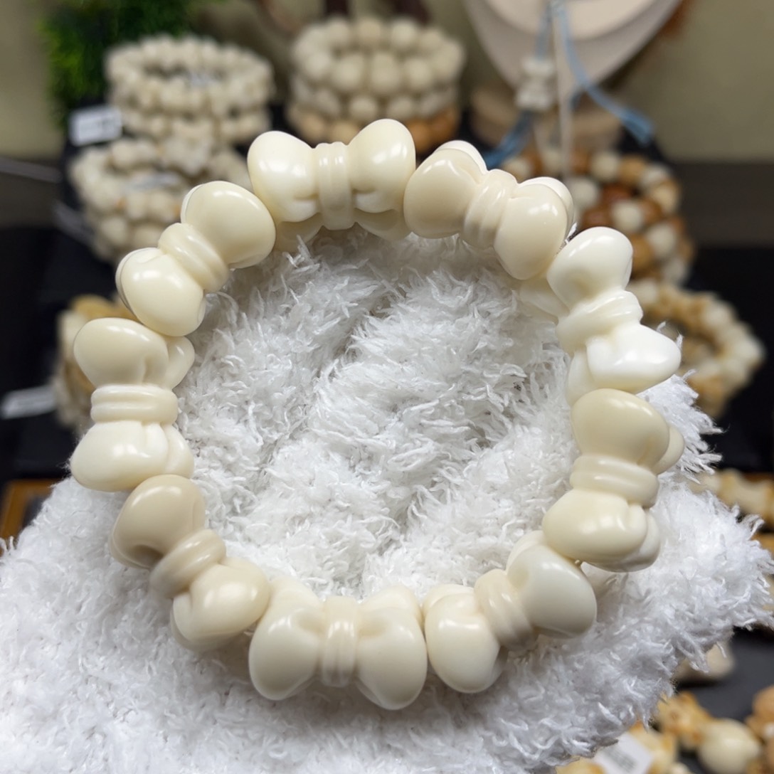 菩提根/象牙果吊坠2.15.34蝴蝶结是全品