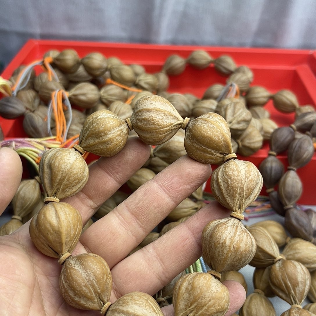 嘟***兜手串橄榄核24矮桩