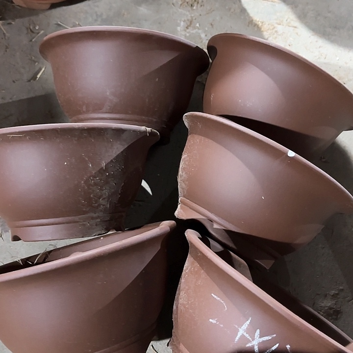 紫砂花盆100-6。  24-12