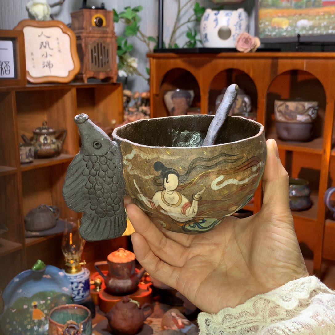 陶柳*手心里的敦煌咖啡杯