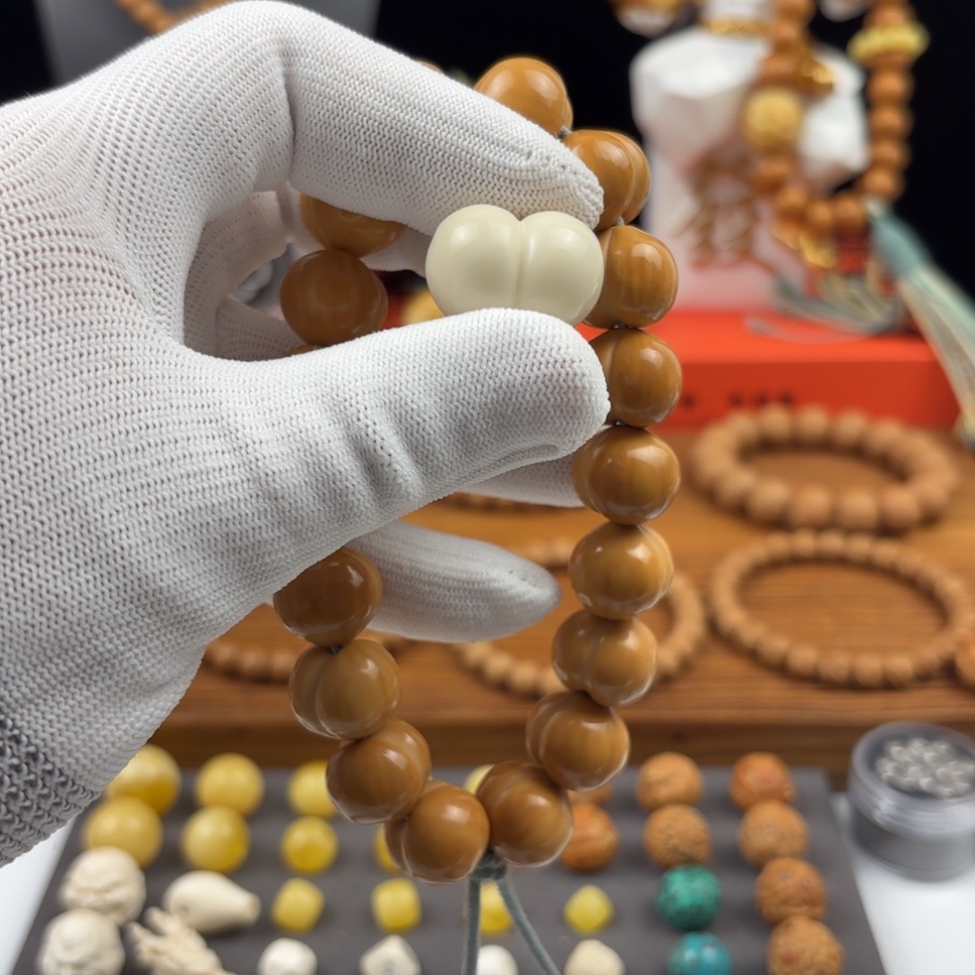 拾***声吊坠猴头核桃屁桃+腰珠+流苏