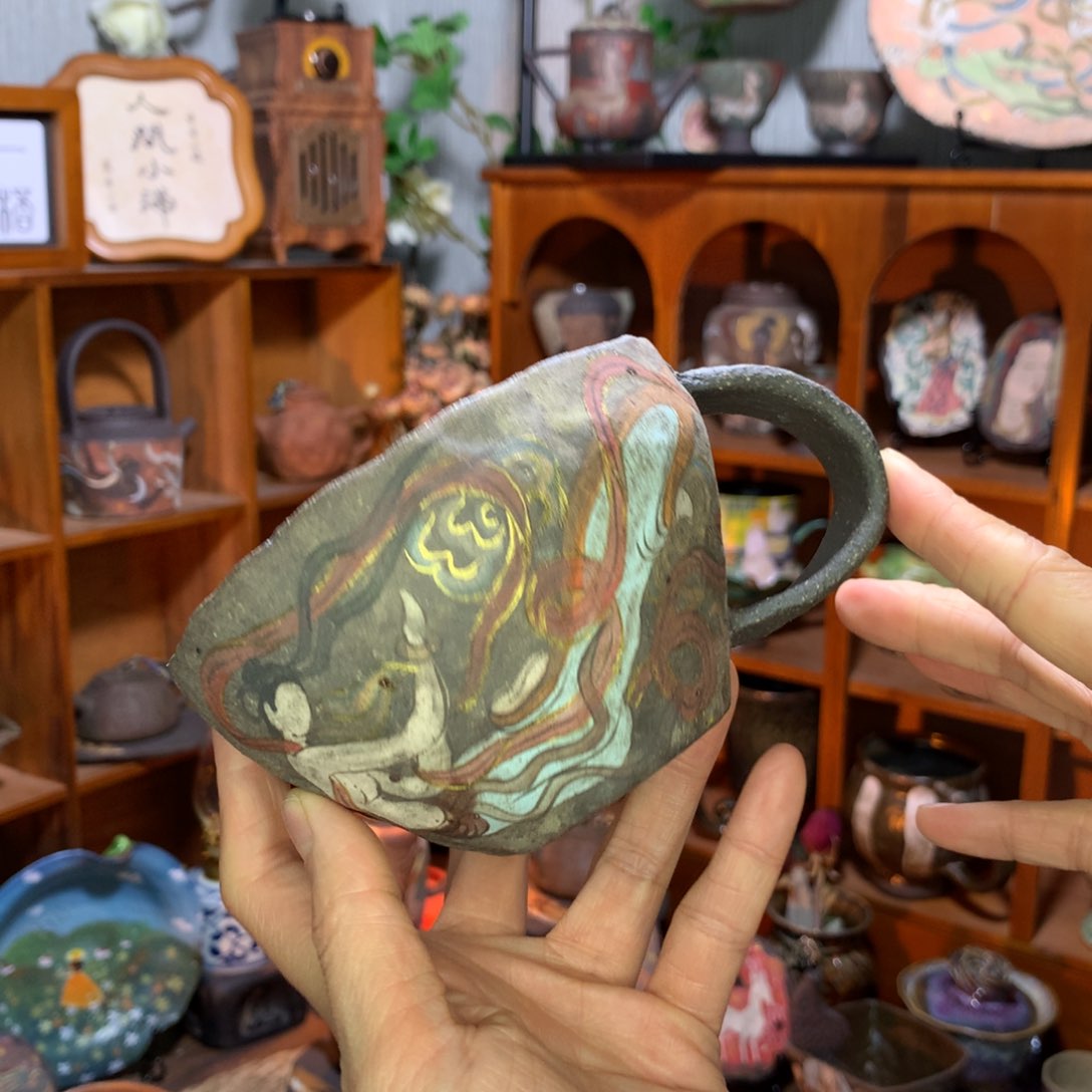 陶手心里的敦煌茶咖杯