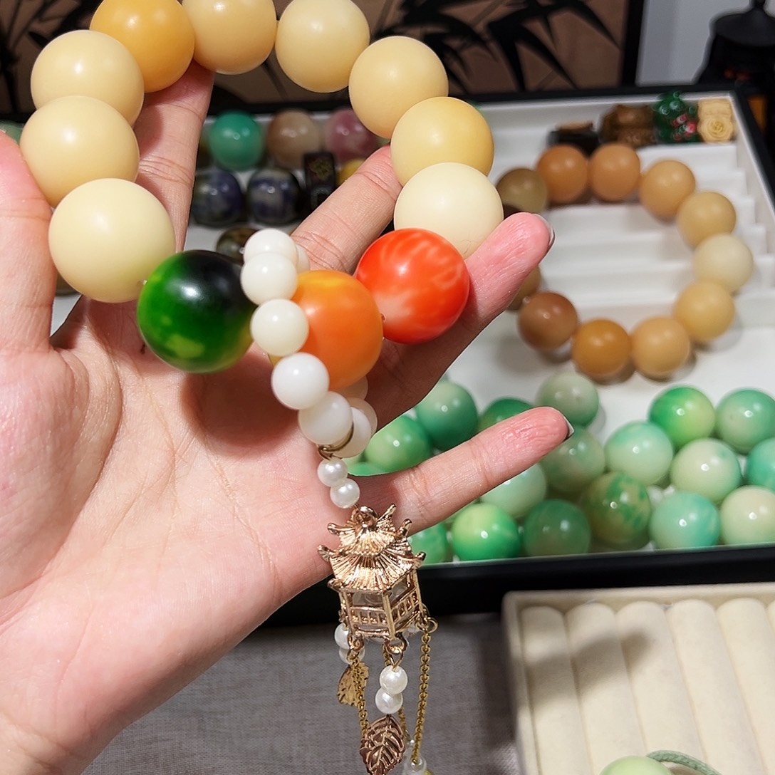 逍***儿菩提根/象牙果吊坠卡24近全品