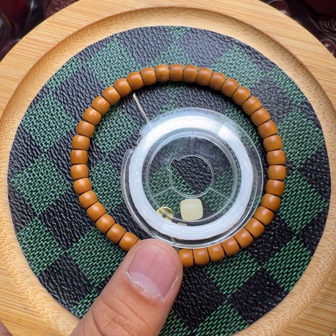 橄榄核吊坠0.6核尖手串