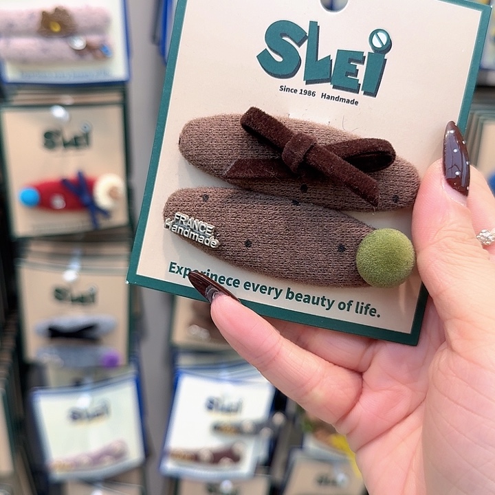 棕色椭圆波点绿豆掰掰