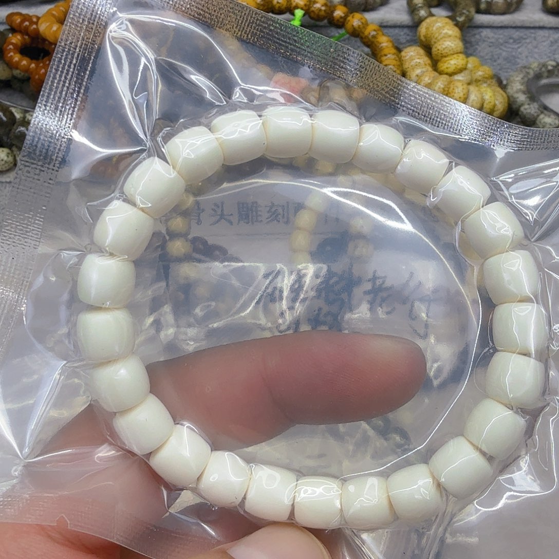 星月菩提手串66白单圈9×8直切有棕裂