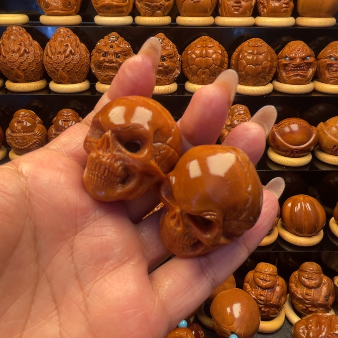 吃***了橄榄核把件手持手球