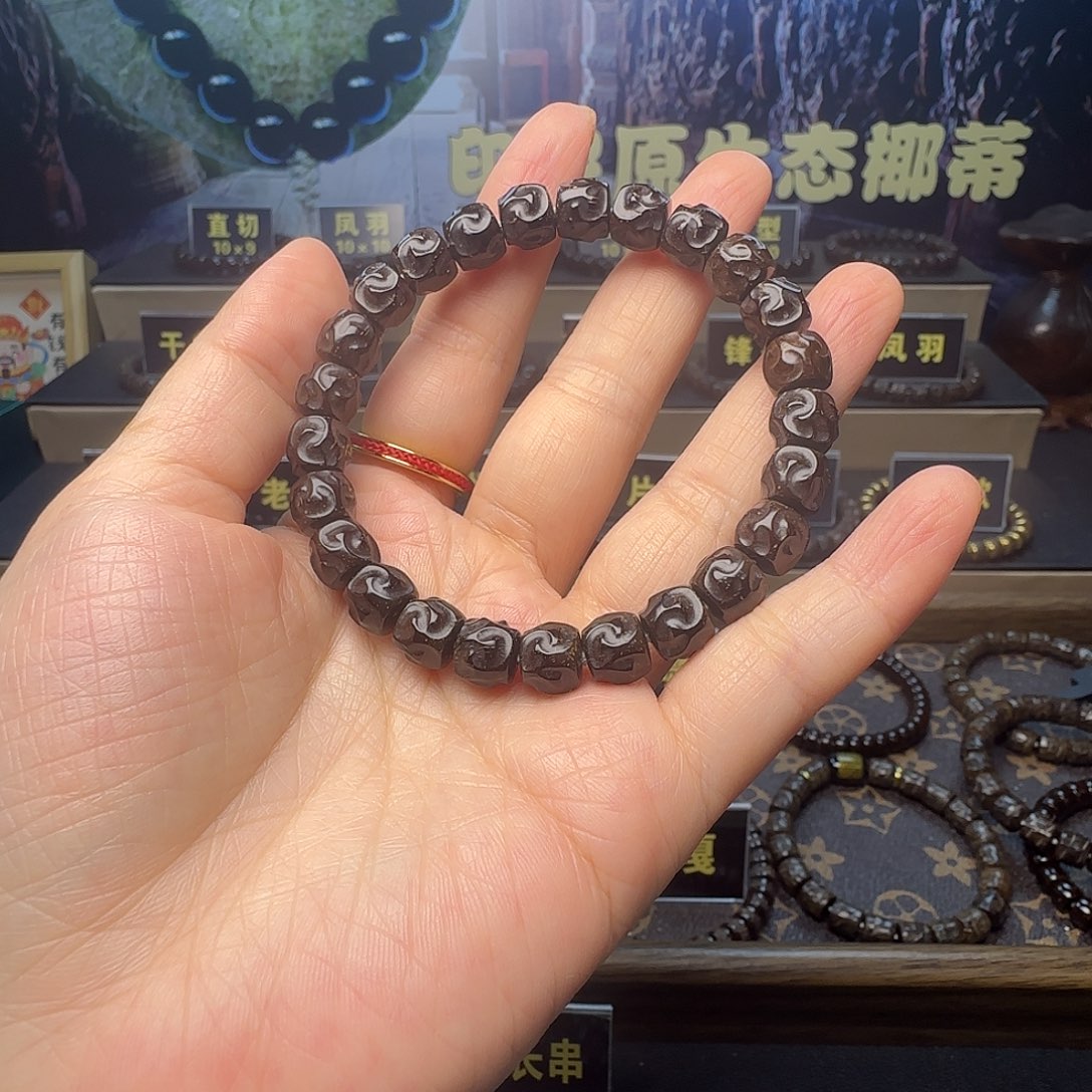 谋***尘椰蒂吊坠印尼原生态椰蒂乱山9×8