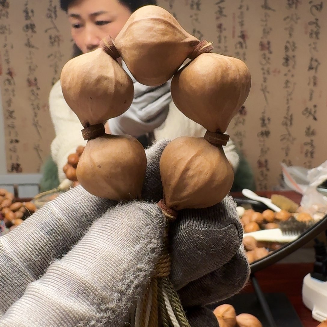 橄榄核把件四花精品手捻